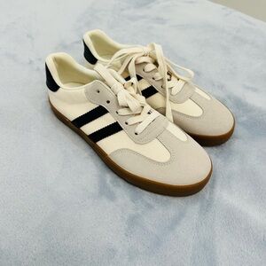 Stylish Cream and Black Sneakers